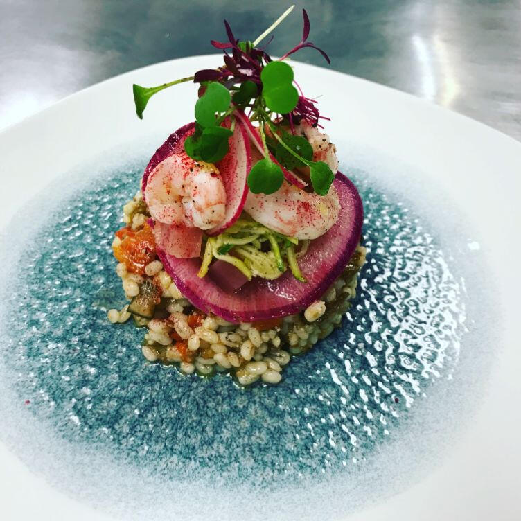 A gourmet dish served on a plate, elegantly garnished, highlighting the artistry of culinary presentation. A gourmet dish served on a plate, elegantly garnished, highlighting the artistry of culinary presentation.